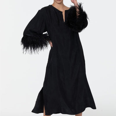 Rya Collection Swan Caftan 539 in Black-Anna Bella Fine Lingerie-The Swan Caftan is a lustrous and regal silhouette for any moment of decadence. This style features ostrich feathers on a soft and comfortable Cupro fabrication. Details: • 60% Cupro, 40% Viscose and Ostrich feathers