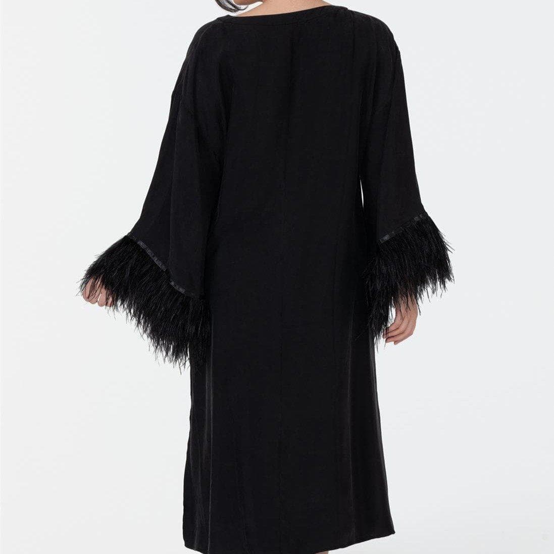 Rya Collection Swan Caftan 539 in Black-Anna Bella Fine Lingerie-The Swan Caftan is a lustrous and regal silhouette for any moment of decadence. This style features ostrich feathers on a soft and comfortable Cupro fabrication. Details: • 60% Cupro, 40% Viscose and Ostrich feathers